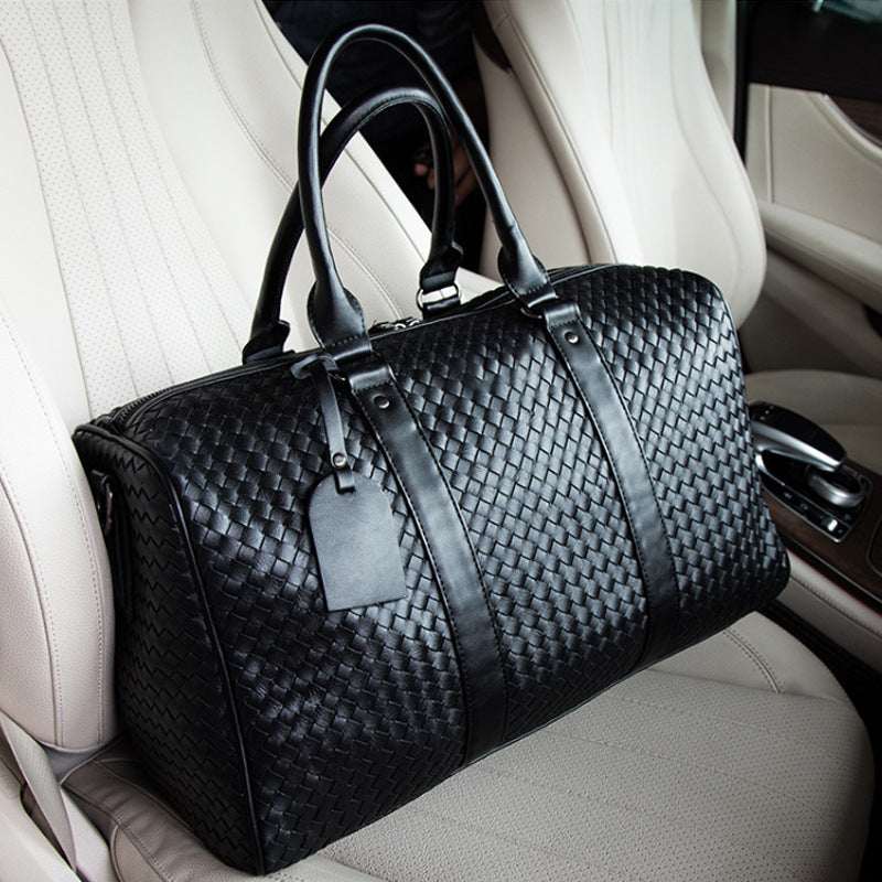 Spot spring new European and American style neutral travel bag business portable big bag solid color single shoulder hand-woven bag Travel DealSniper.net