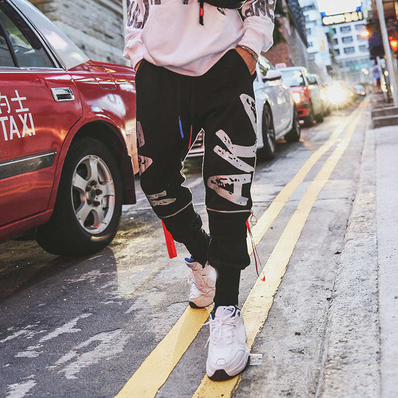 Europe and the United States hip hop Harajuku style pants male Korean version of the trend of the port wind print wild beam leg casual pants