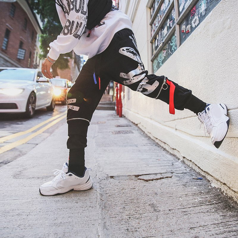 Europe and the United States hip hop Harajuku style pants male Korean version of the trend of the port wind print wild beam leg casual pants