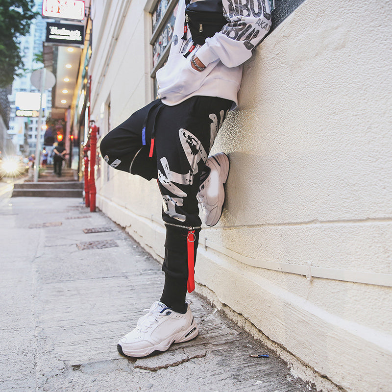 Europe and the United States hip hop Harajuku style pants male Korean version of the trend of the port wind print wild beam leg casual pants