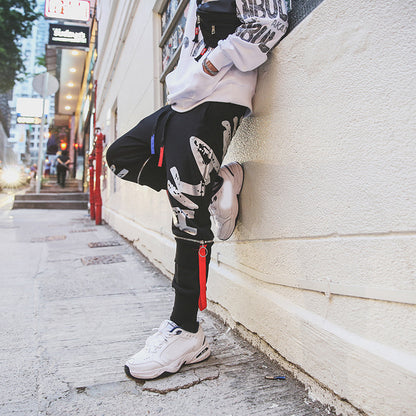 Europe and the United States hip hop Harajuku style pants male Korean version of the trend of the port wind print wild beam leg casual pants