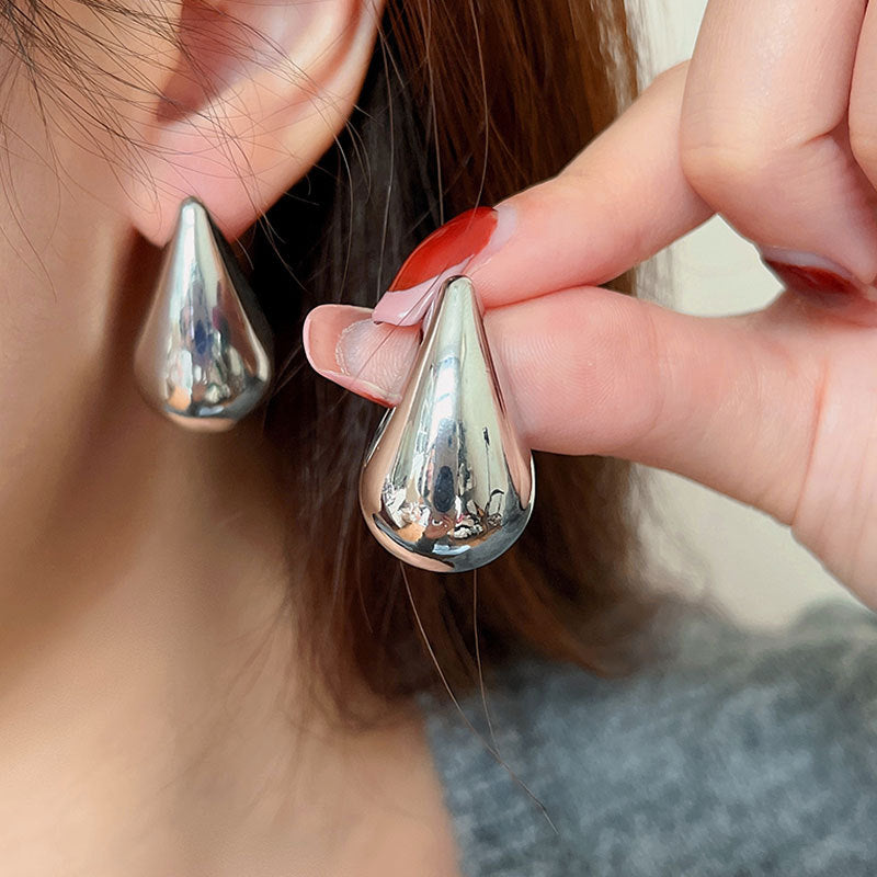 Droplet Shaped Silver Needle Earrings With A Cool Style